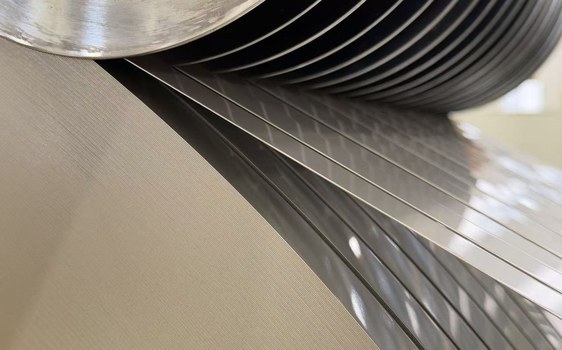 Slitting inspection evidence from our feedstock brochure; order records identify the actual coil.