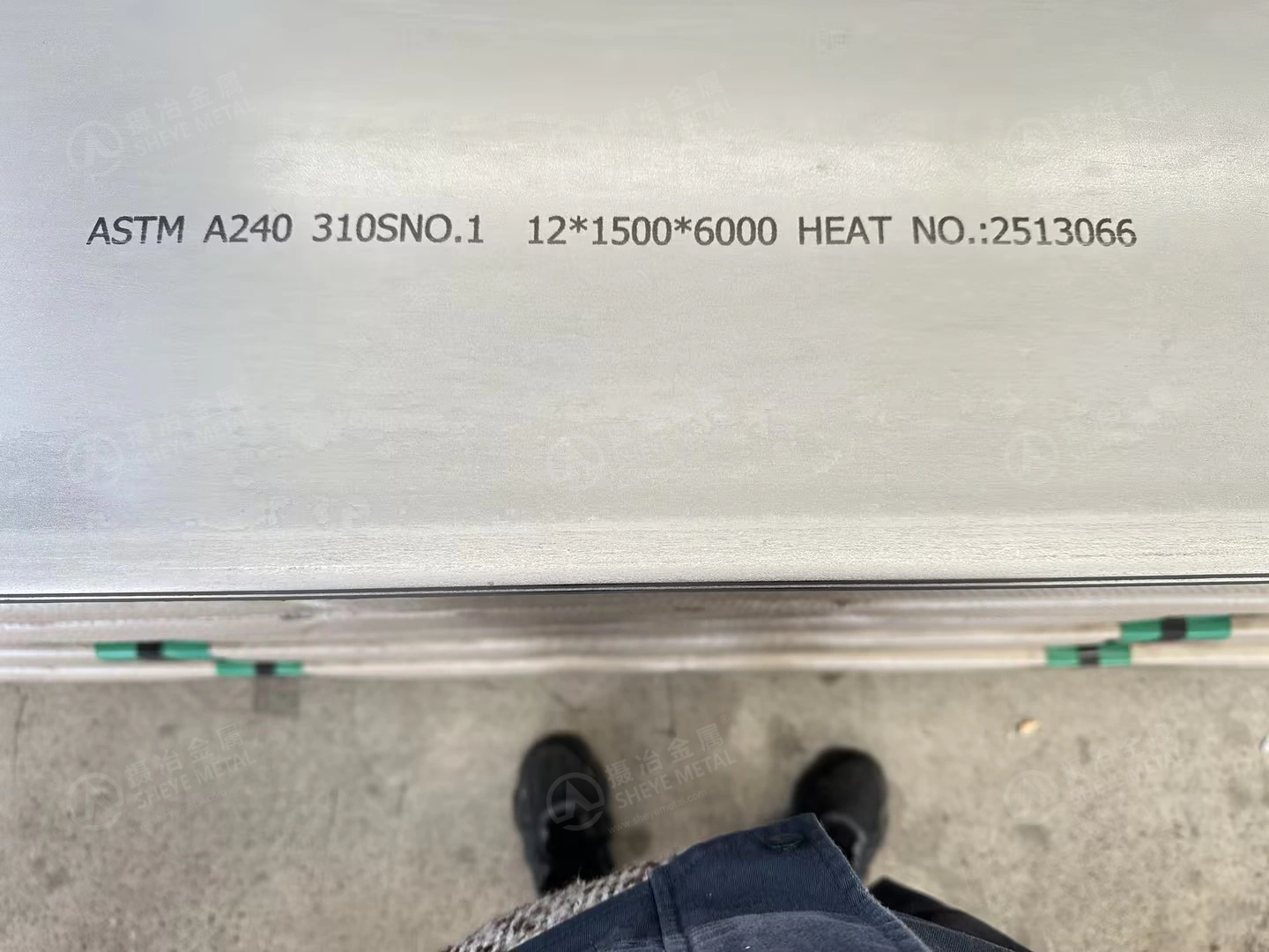 Plate marking showing ASTM A240, 310S, No.1 finish, 12 × 1500 × 6000 mm and a heat number.